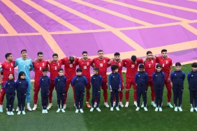 Iranian football team refuses to sing national anthem in protest 