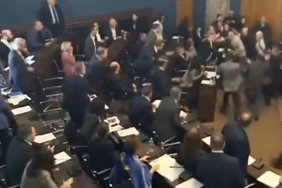 Opposition MP assaults ruling party executive secretary during transparency bill debate