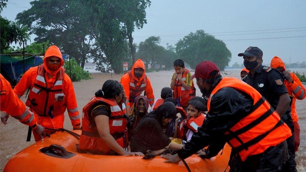 Rescuers search for survivors after heavy rains