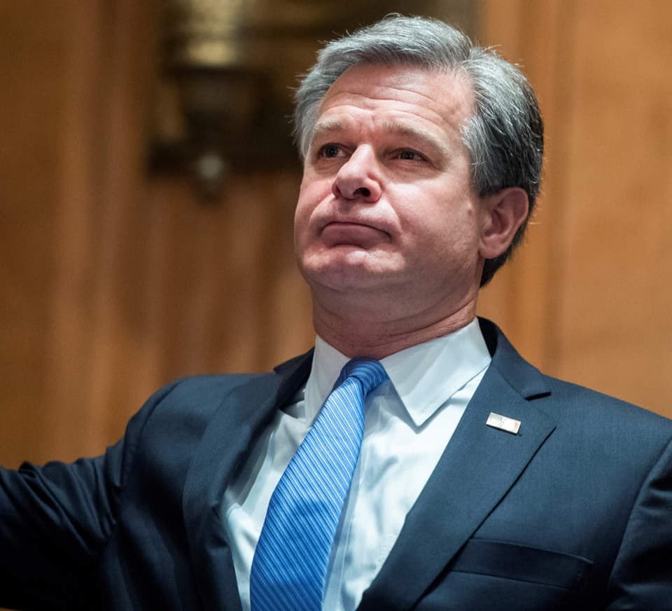 FBI Director Wray knocks down conspiracy theory that January 6 rioters were ‘fake Trump protesters’