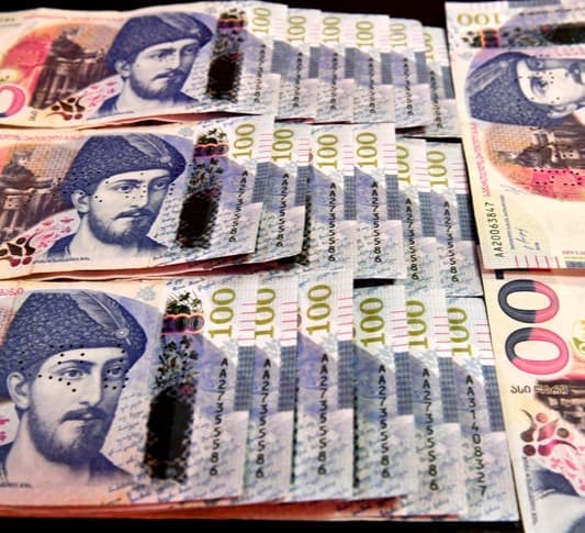 დიდი ოდენობით ყალბი ფულის დამზადება-გასაღების ფაქტზე ოთხი პირი დააკავეს