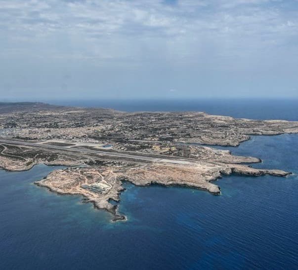 More than 1,000 migrants arrive on Italian island