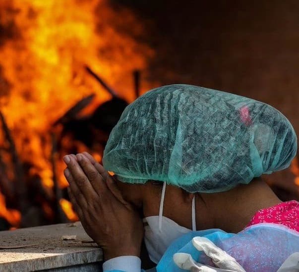 India records 300,000 Covid deaths as pandemic rages
