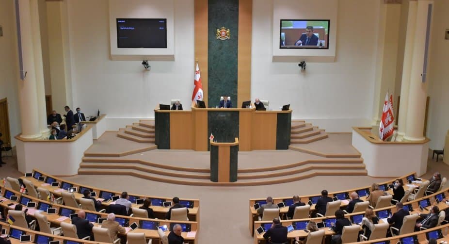 Parliament suspends status for three opposition MPs