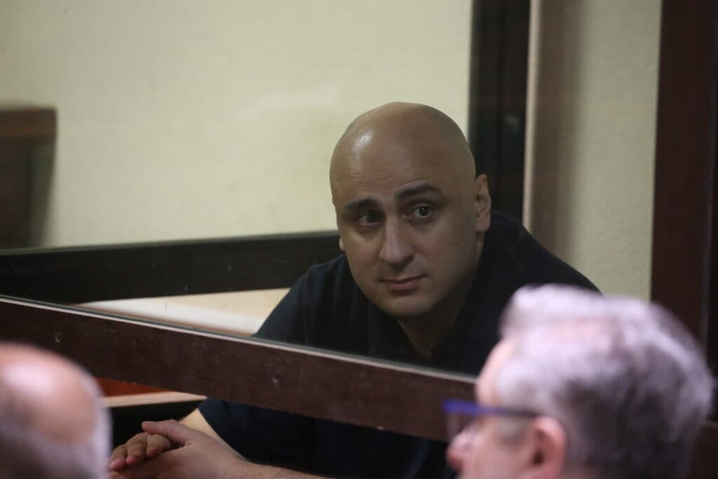 The most recent charge against Melia involves contempt of court, after he splashed water at Judge Irakli Shvangiradze during a tense hearing. 