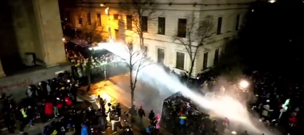 Police use water cannons to disperse protesters near Georgian Parliament