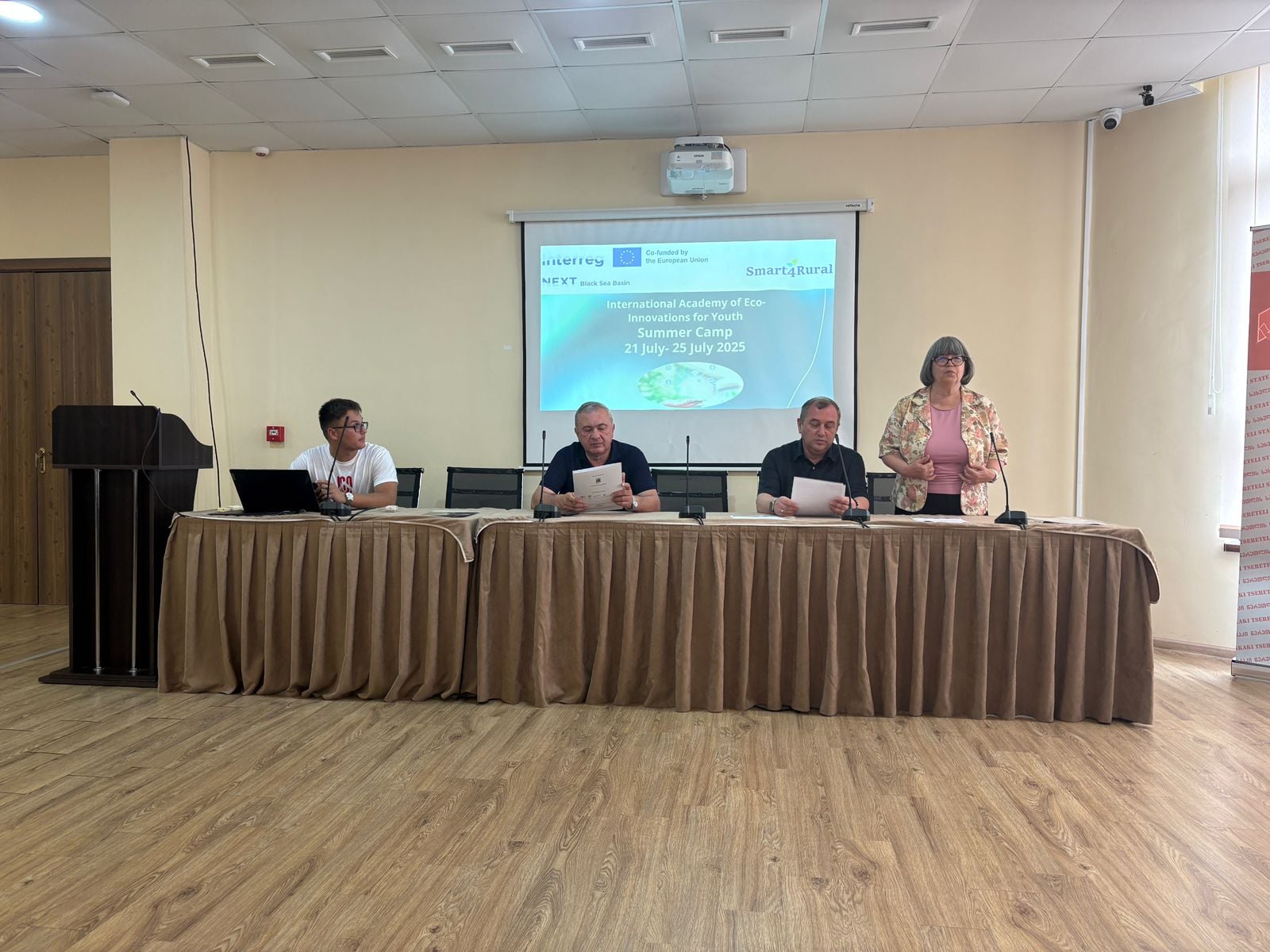 <p style="text-align: justify">წყალტუბოს მუნიციპალიტეტში საერთაშორისო პროექტის „სმარტი და ინოვაციური გადაწყვეტილებები შავი ზღვის ქვეყნებში მწვანე და სუფთა სასოფლო თემებისათვის – Smart4Rural“ ფარგლებში საზაფხულო ეკო ბანაკი გაიხსნა. ბანაკში მონაწილეობენ ახალგაზრდები საქართველოდან, რუმინეთიდან და მოლდოვიდან.</p><p style="text-align: justify">ბანაკის გახსნისას პროექტის მიზნებსა და ეკოაქტივობების მნიშვნელობაზე ისაუბრა პროექტის მენეჯერმა, იმერეთის მხარის მეცნიერთა კავშირ „სპექტრის“ თავმჯდომარემ ქეთევან ცხაკაიამ. ახალგაზრდებს სიტყვით მიმართა და წარმატებები უსურვა პროექტის კოორდინატორმა მაია ფანჩულიძემ. ღონისძიებას ესწრებოდნენ ქუთაისის სახელმწიფო უნივერსიტეტის რექტორი შალვა კირთაძე და საგარეო ურთიერთობათა და განვითარების სამსახურის უფროსი დავით გეგეჭკორი, რომლებმაც ხაზი გაუსვეს გარემოსდაცვით პროგრამებში ახალგაზრდების ჩართულობის მნიშვნელობას.</p><p style="text-align: justify">მონაწილეებმა მოლდოვის ქალაქ უნგენიდან და რუმინეთის ქალაქ გალაციდან წარმოადგინეს პრეზენტაციები ადგილობრივ ეკოინიციატივებზე. ბანაკის ფარგლებში დაგეგმილია მასტერკლასები ურბანული და სოფლის თემებისთვის ჭკვიანი და მდგრადი განვითარების გადაწყვეტილებებზე, აგრეთვე ახალგაზრდებისთვის შექმნილი ქსელური და შემეცნებითი სივრცეები, რაც ხელს შეუწყობს &nbsp;გამოცდილების გაზიარებასა და გუნდური მუშაობის განვითარებას.</p><p style="text-align: justify">ბანაკის ერთ-ერთი მთავარი მიზანია "იდეათონის" ჩატარება, რომლის დროს მონაწილეებს შესაძლებლობა ექნებათ წარმოადგინონ კრეატიული და სმარტ-ეკოინოვაციური პროექტები. &nbsp;ეკო ბანაკში &nbsp;18 მონაწილე &nbsp;5 დღეს გაატარებს.&nbsp;</p><p style="text-align: justify">პროექტი Smart4Rural დაფინანსებულია ევროკავშირის INTERREG VI-B „შავი ზღვის აუზის ქვეყნების NEXT პროგრამის“ ფარგლებში და მას ოთხი ქვეყანა – საქართველო, რუმინეთი, მოლდოვა და თურქეთი  ერთობლივად ახორციელებს.</p>
