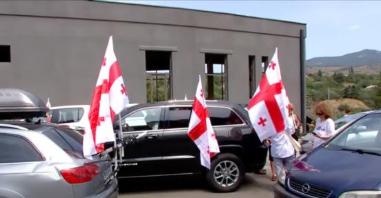 Georgians march toward occupation line to mark 2008 war anniversary